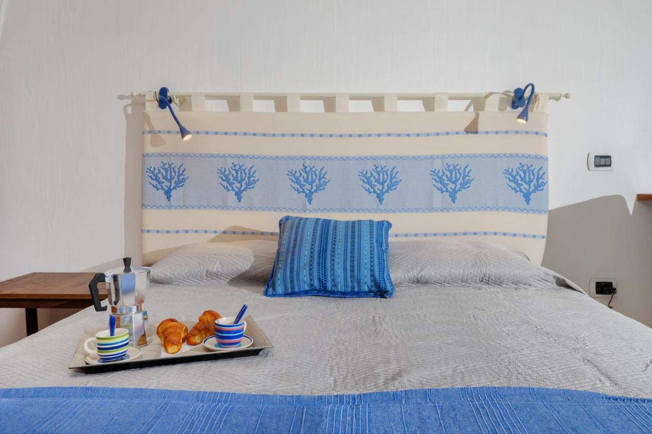 Villetta Azzurro - Sherdenia Luxury Apartments มาริเนลลา ภายนอก รูปภาพ